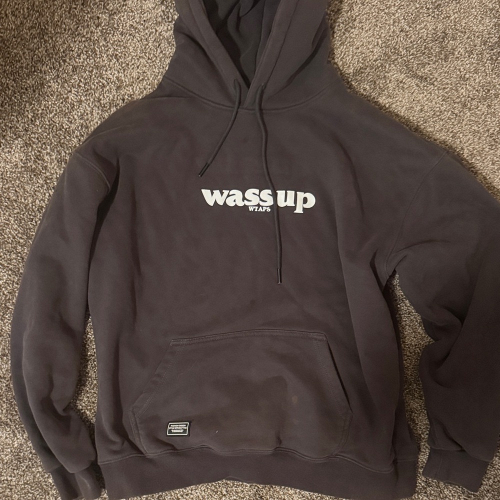 Black Hoodie with 'Wassup' Graphic